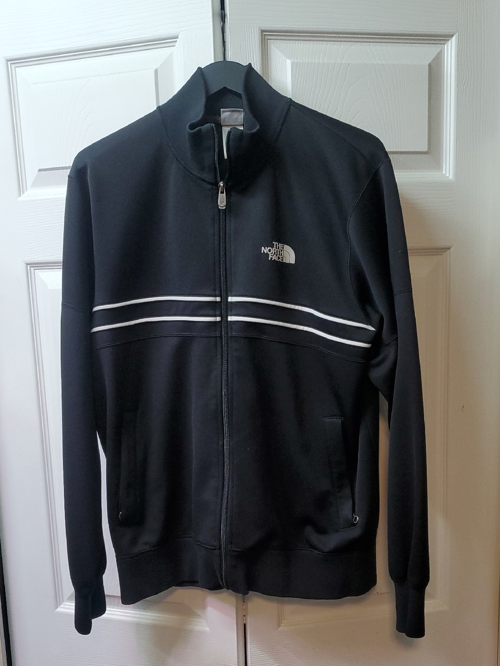 The North Face Men's Black Zip-Up Jacket with White Stripe